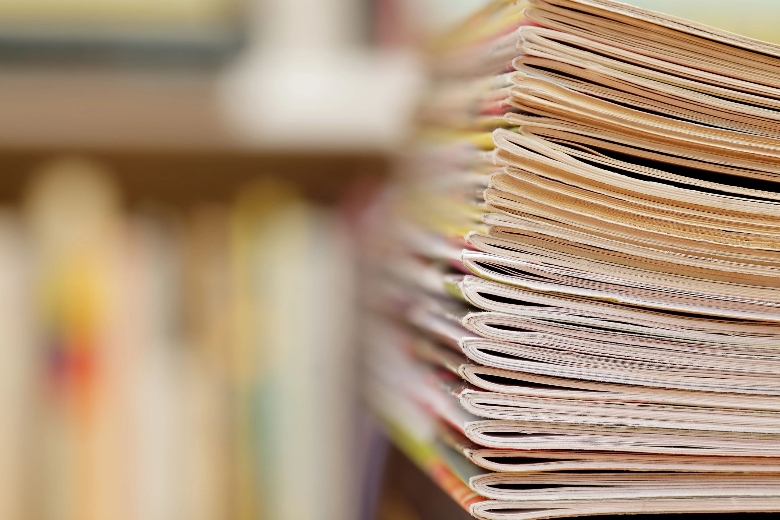Colourful magazines representing a customer avatar
